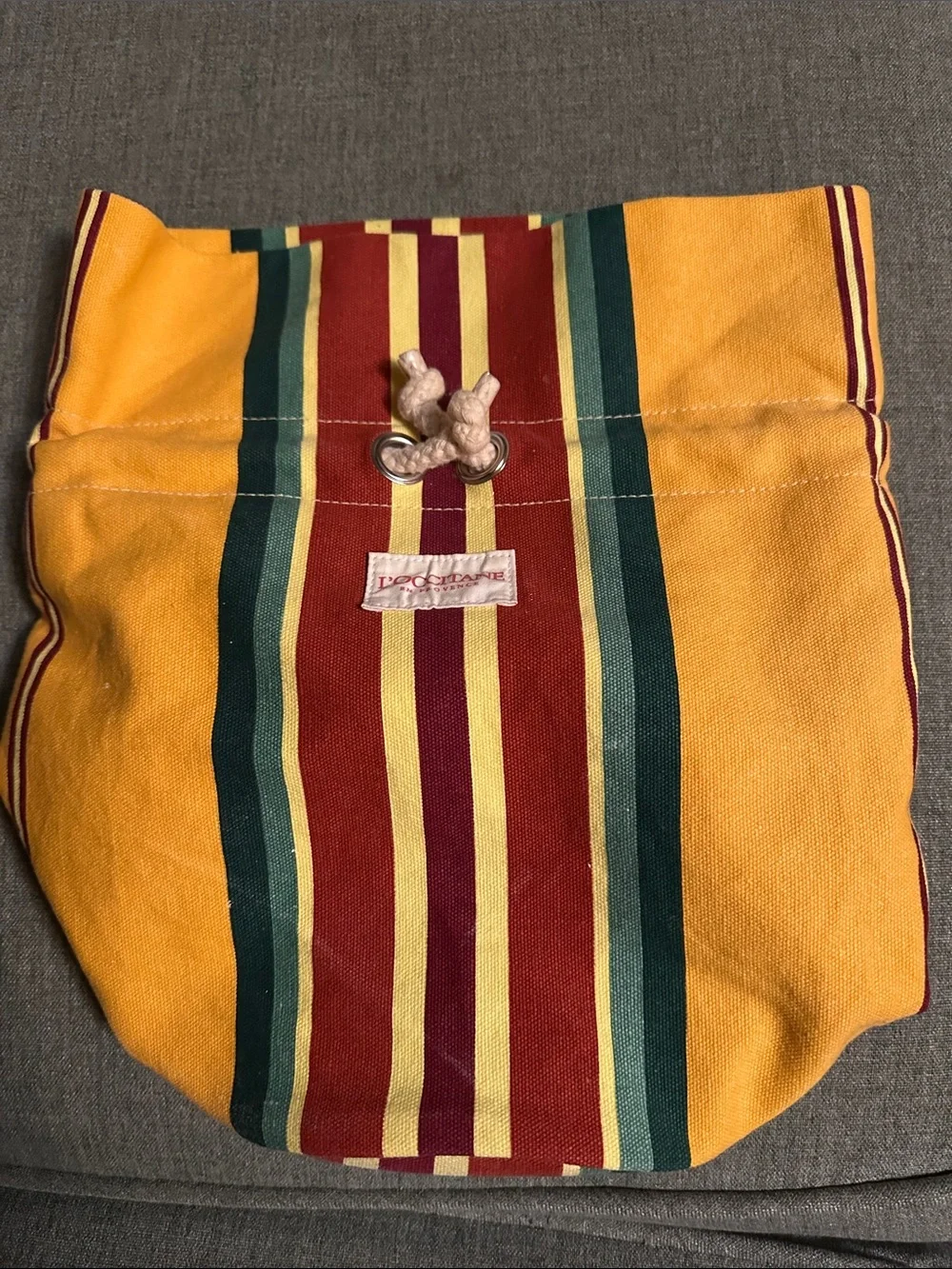 L'OCCITANE Red, Yellow & Burgundy Striped Drawstring Pouch Bucket Bag